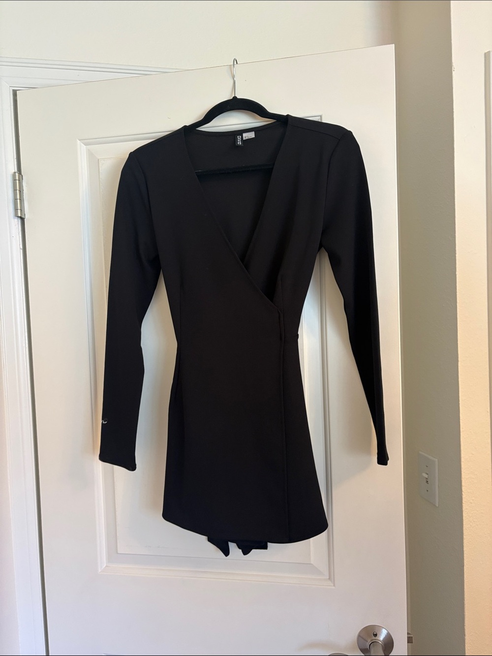 Divided Black Long-Sleeve Mini Wrap Dress